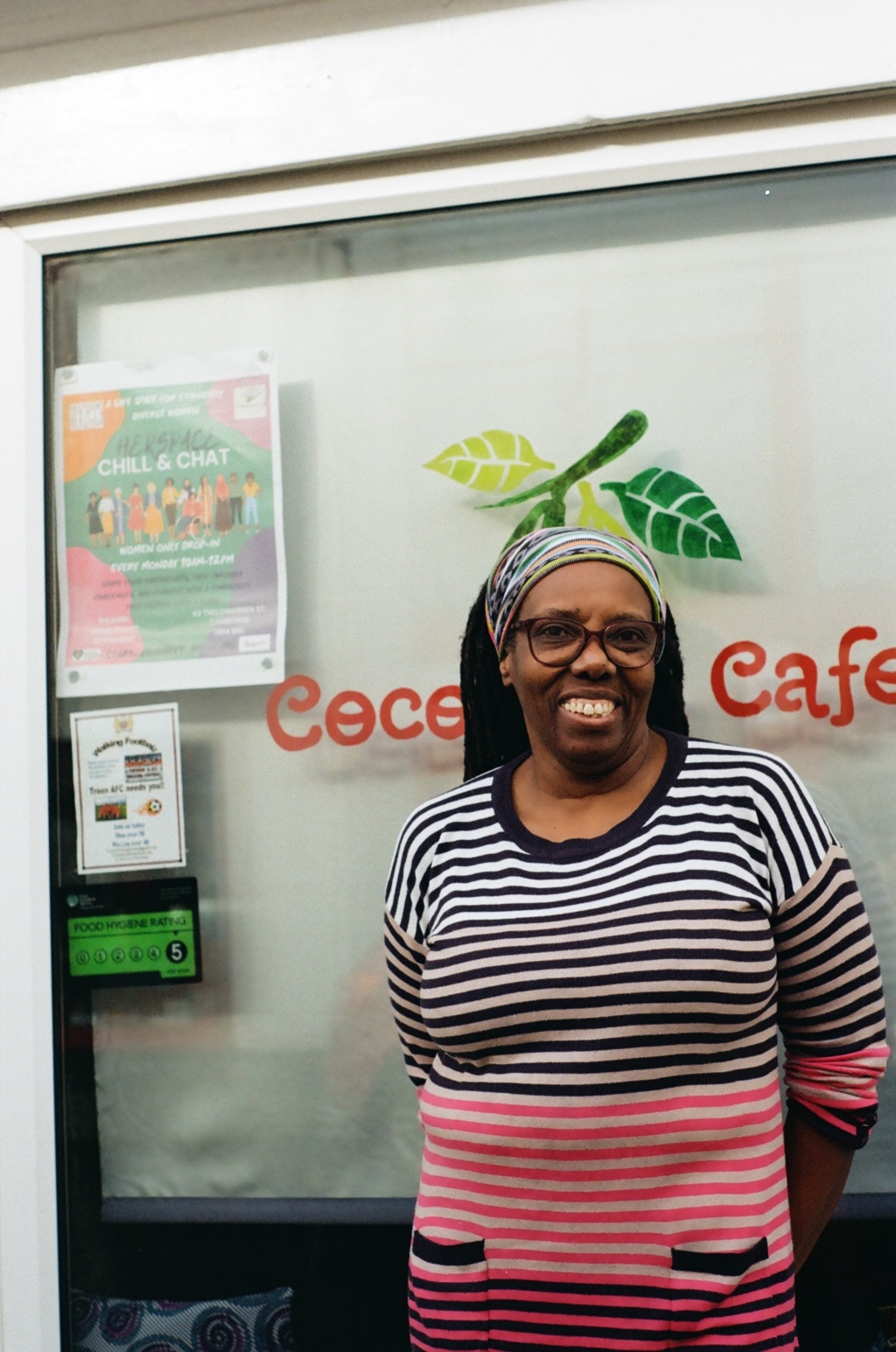 Bev in front of her store