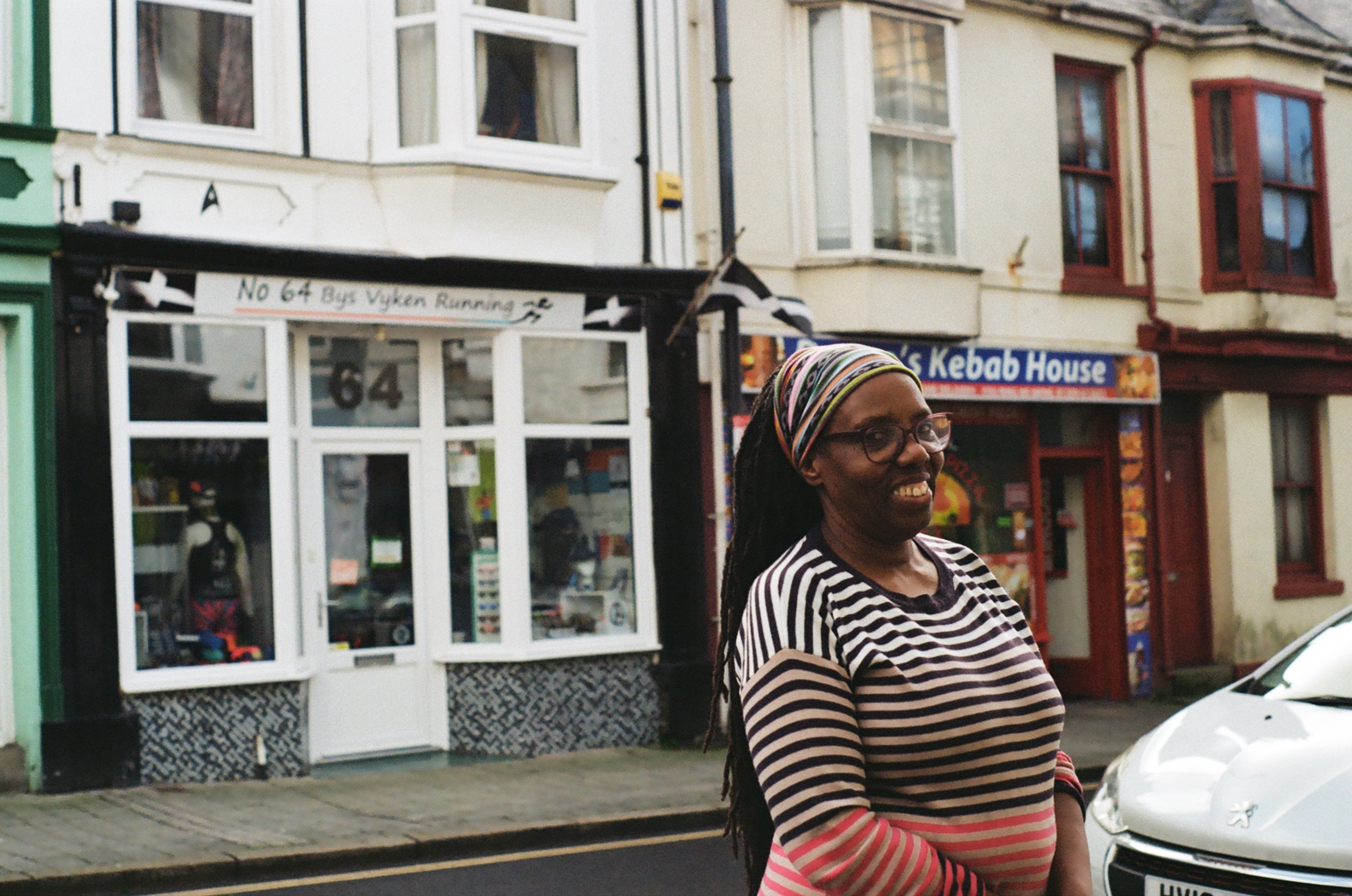 Bev smiling while on the street