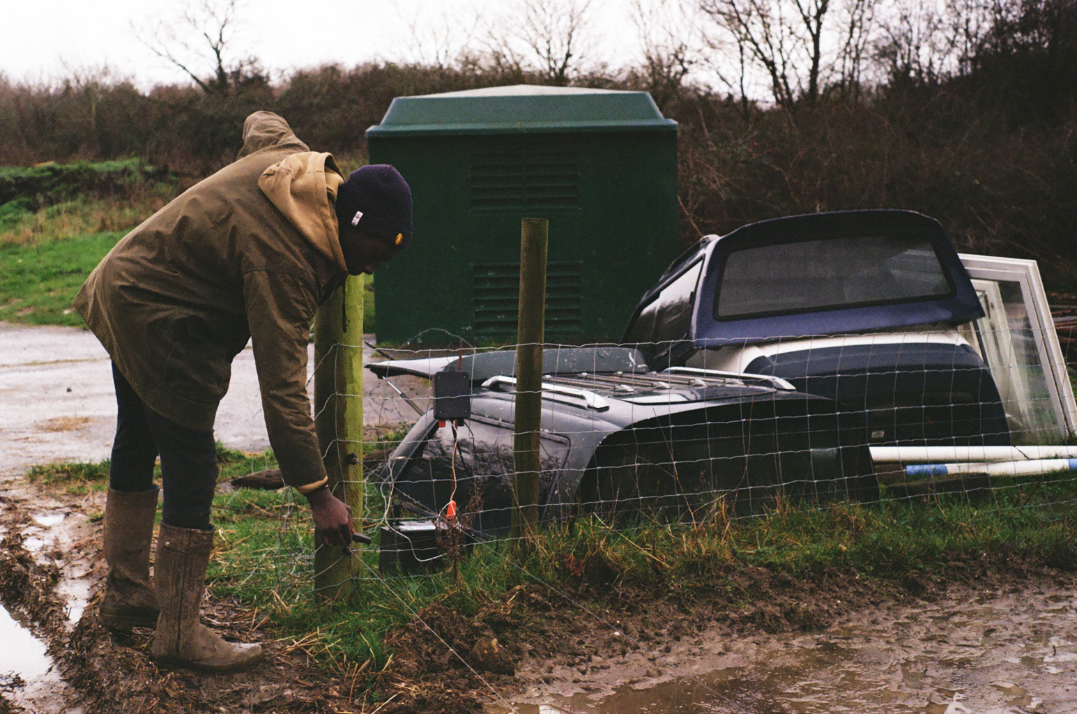 Flavian fixing a fence post