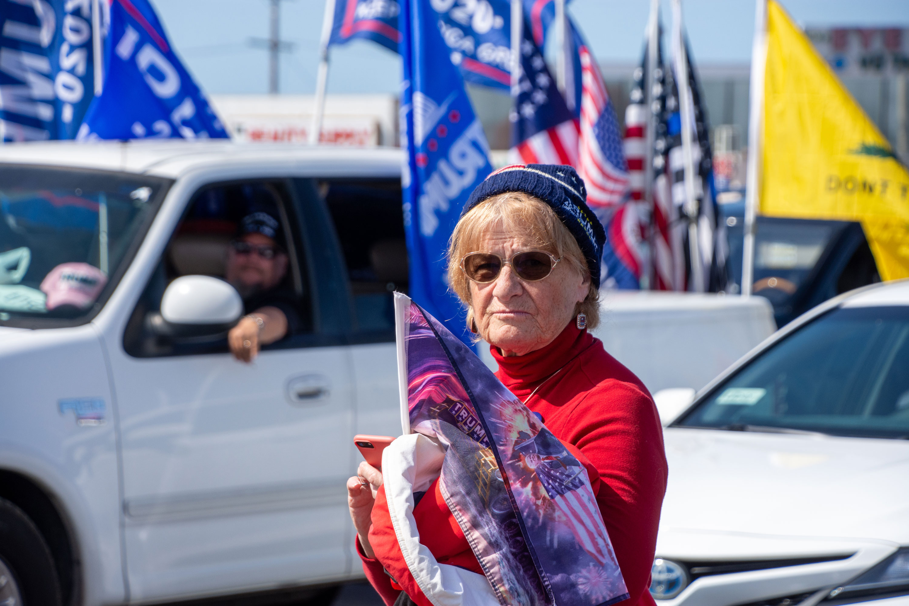 Trump supporter in Orange County’s Westminster prepares to drive to freedom rally in Huntington Beach.