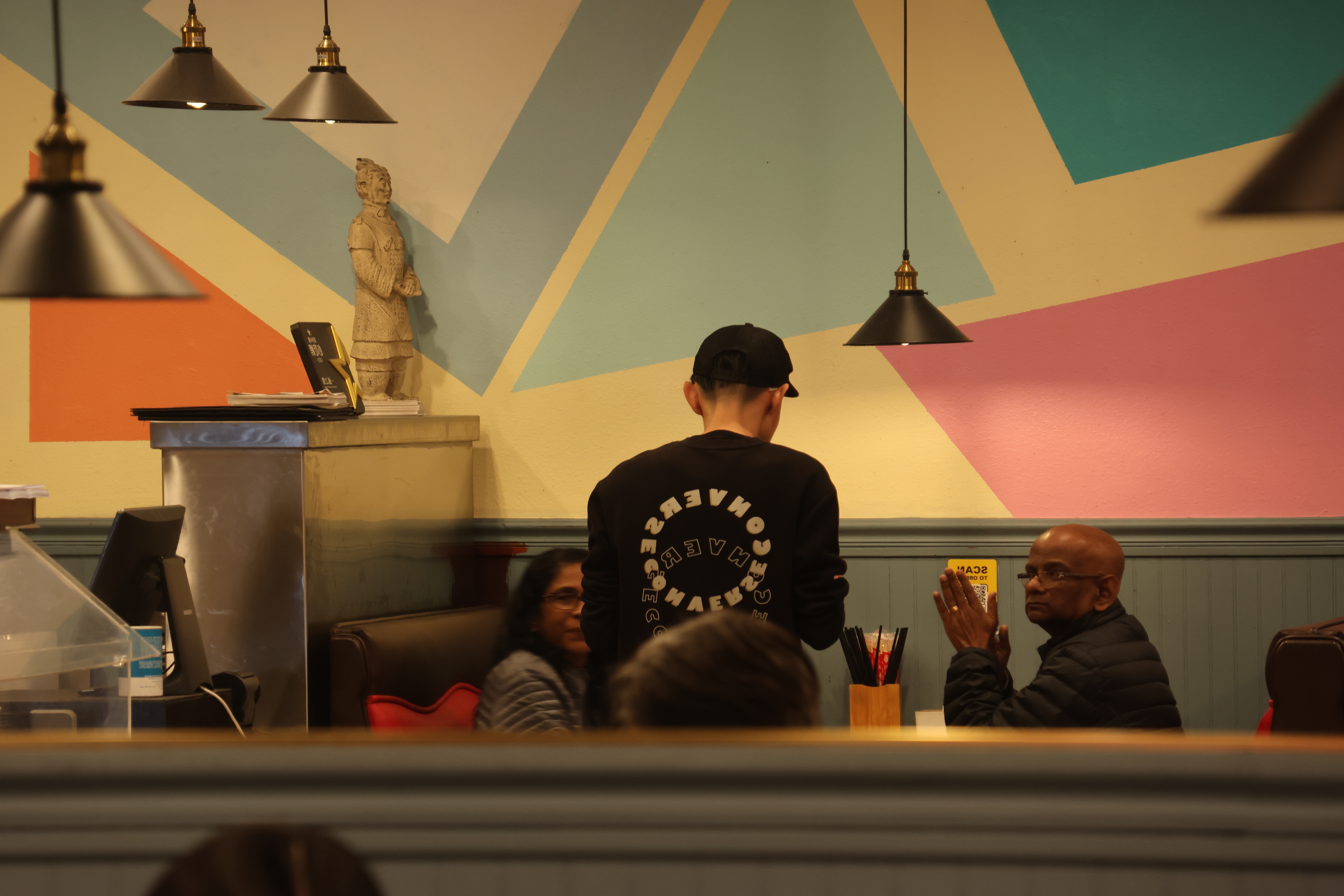 Leo working at noodle shop